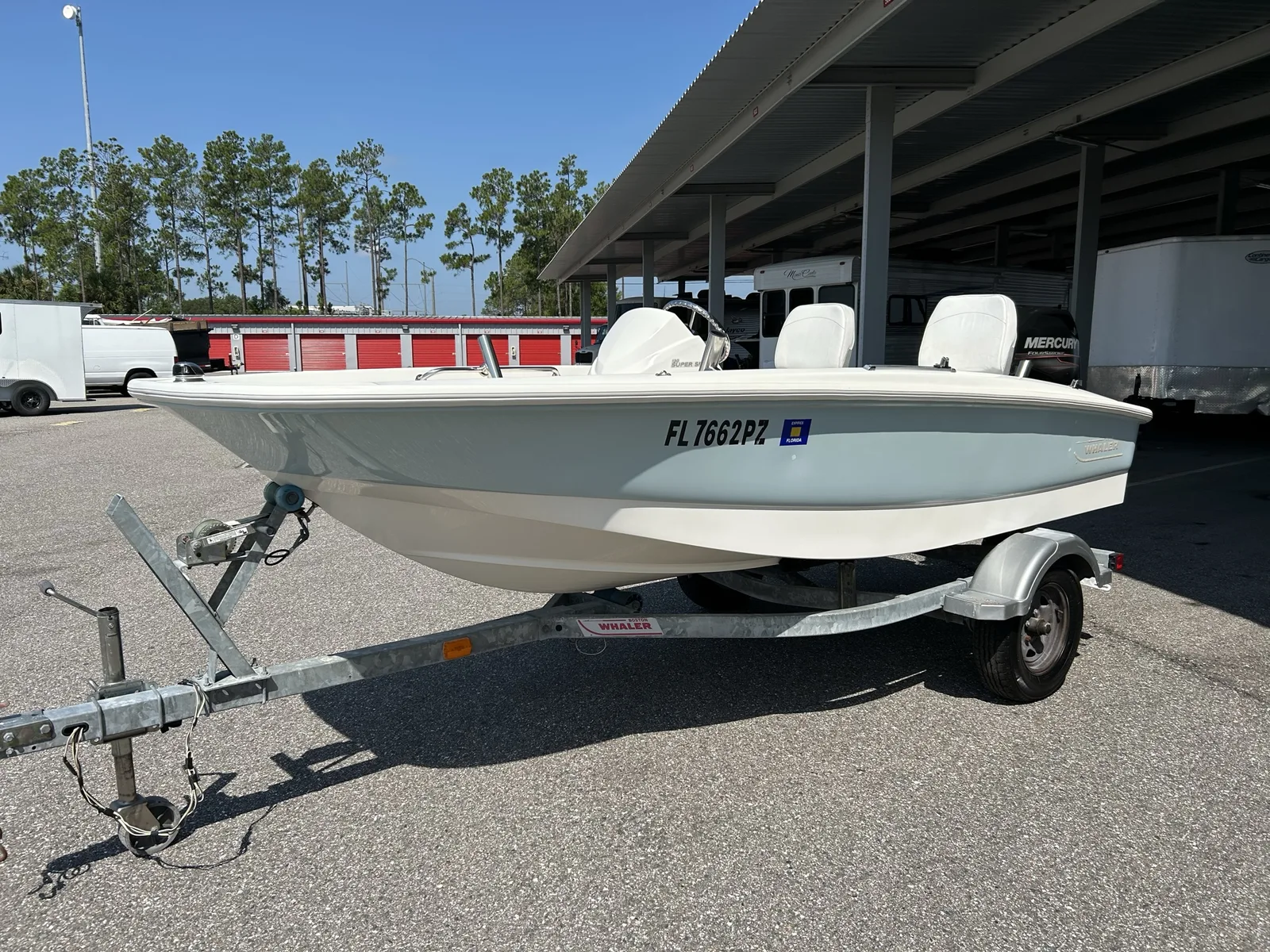 2013 Boston Whaler Super Sport on its included single-axle trailer