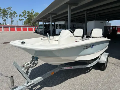 Boston Whaler boat and trailer, alternate view