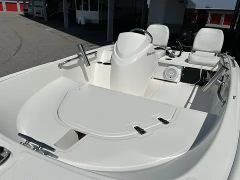 Bow deck, console, padded seating and rod holders